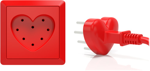 Red, heart-shaped electrical socket with matching plug and cord